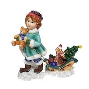 Vintage porcelain Christmas Victorian girl pulling sled